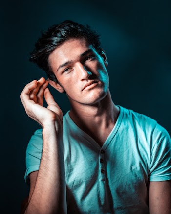 Photo of Man Wearing Blue Shirt