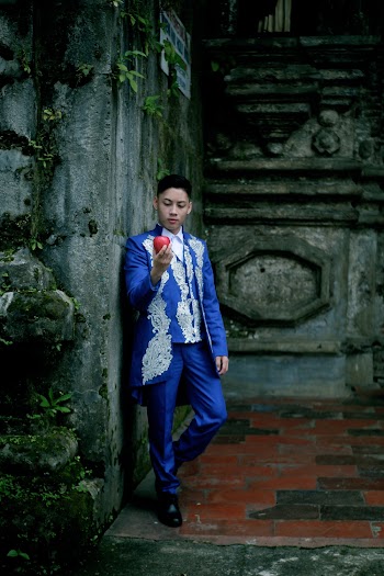 Photo of Man Wearing Blue Suit