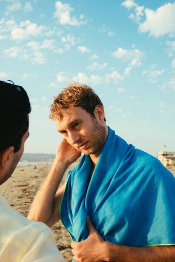 Photo Of Man Wearing Blue Towel