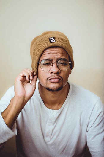 Photo of Man Wearing Brown Beanie