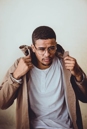Photo of Man Wearing Brown Coat