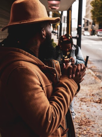 Photo of Man Wearing Brown Jacket
