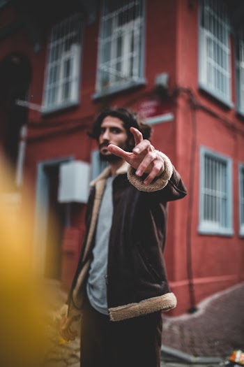 Photo of Man Wearing Brown Jacket