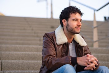 Photo of Man Wearing Brown Leather Jacket