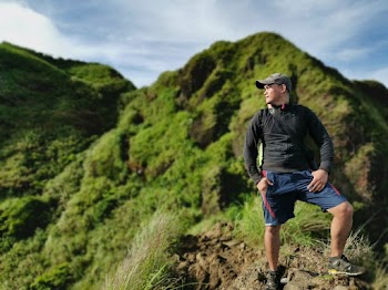 Photo of Man Wearing Cap and Jacket