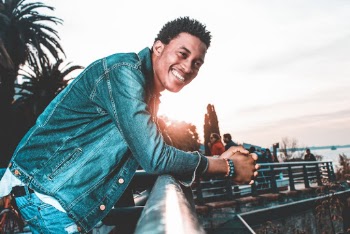 Photo of Man Wearing Denim Jacket