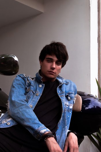Photo of Man Wearing Denim Jacket