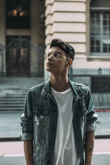 Photo of Man Wearing Denim Jacket
