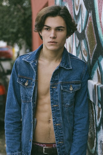 Photo of Man Wearing Denim Jacket