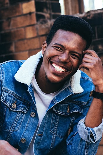 Photo of Man Wearing Denim Jacket