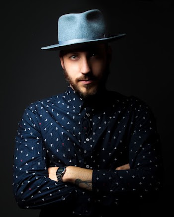 Photo of Man Wearing Dress Shirt and Fedora