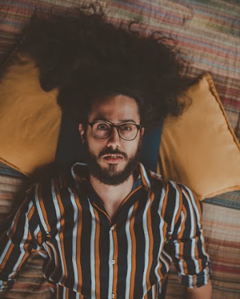 Photo Of Man Wearing Eyeglasses