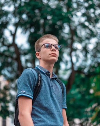 Photo Of Man Wearing Eyeglasses