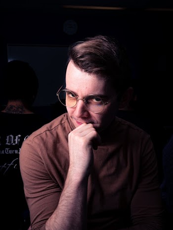 Photo Of Man Wearing Eyeglasses