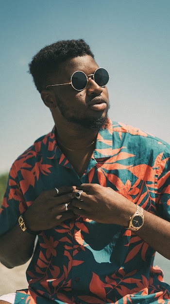 Photo Of Man Wearing Floral Polo