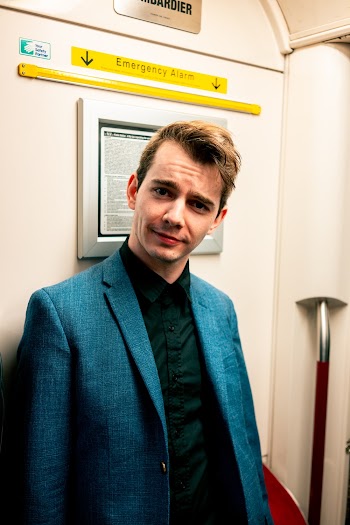 Photo of Man Wearing Formal Coat
