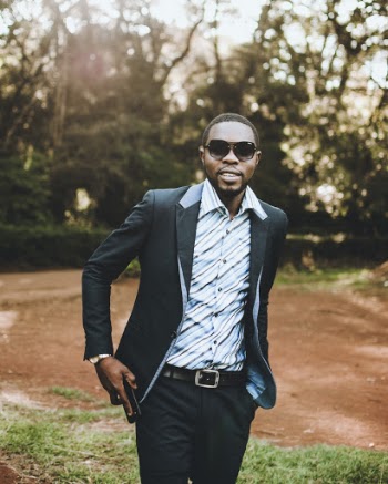 Photo of Man Wearing Formal Coat