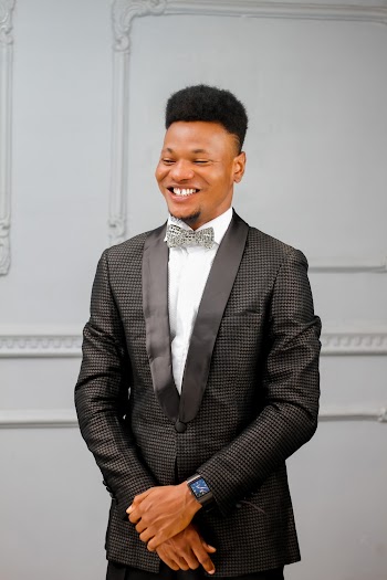 Photo of Man Wearing Formal Coat and Bow Tie