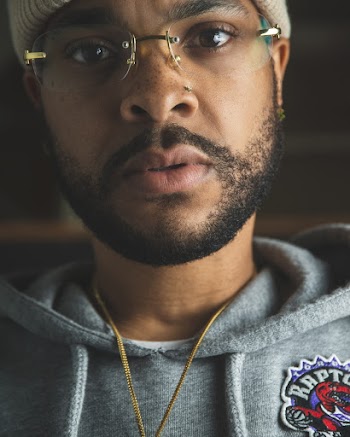 Photo Of Man Wearing Gray Hoodie