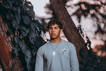 Photo Of Man Wearing Gray Sweater