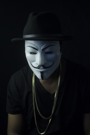 Photo of Man Wearing Guy Fawkes Mask