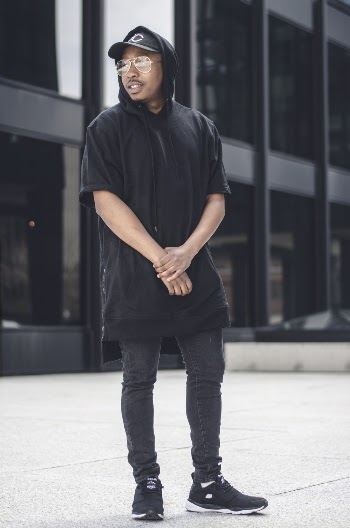 Photo of Man Wearing Hoodie