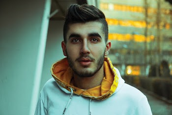 Photo Of Man Wearing Hoodie