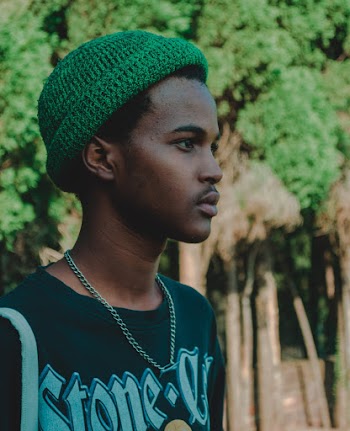 Photo of Man Wearing Knit Cap