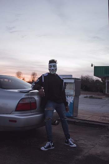 Photo of Man Wearing Mask