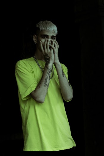 Photo of Man Wearing Neon Green Shirt