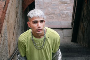 Photo of Man Wearing Neon Green Shirt