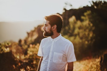 Photo of Man Wearing Polo Shirt