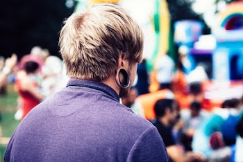 Photo of Man Wearing Purple Shirt