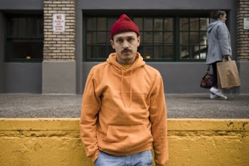 Photo of Man Wearing Red Beanie