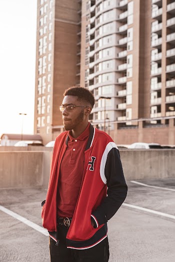 Photo of Man Wearing Red Jacket