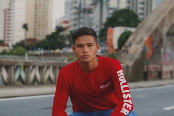 Photo of Man Wearing Red Long Sleeves