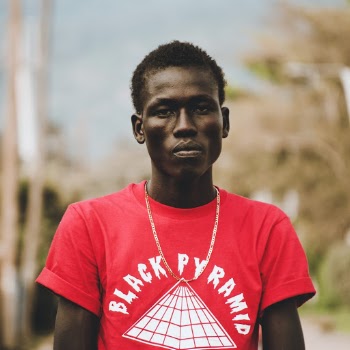 Photo of Man Wearing Red Shirt