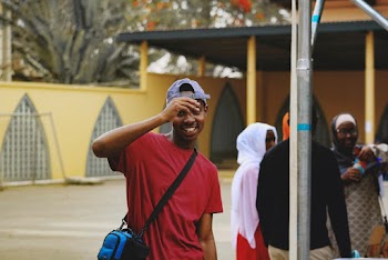 Photo of Man Wearing Red Shirt