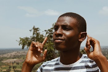 Photo Of Man Wearing Striped Shirt 