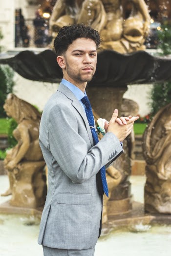 Photo of Man Wearing Suit