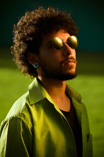 Photo of Man Wearing Sunglasses