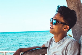 Photo of Man Wearing Sunglasses