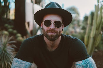 Photo of Man Wearing Sunglasses