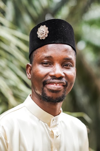 Photo Of Man Wearing Traditional Headwear