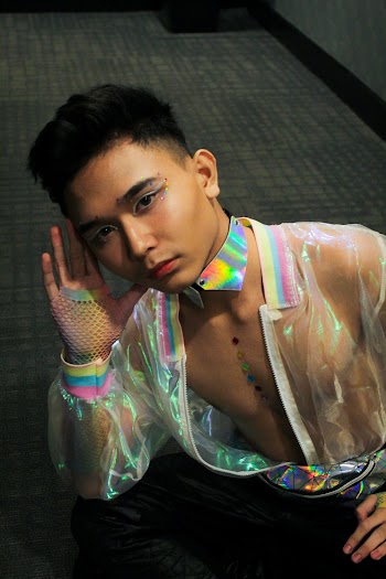 Photo Of Man Wearing Transparent Coat