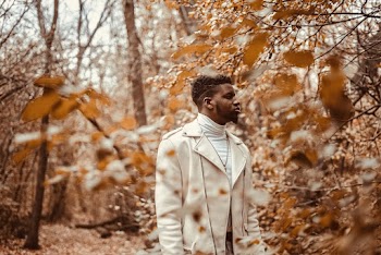 Photo of Man Wearing White Coat