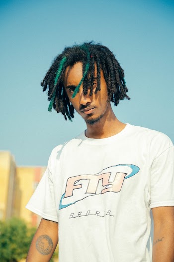Photo of Man Wearing White Shirt