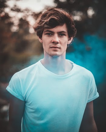 Photo of Man Wearing White Shirt