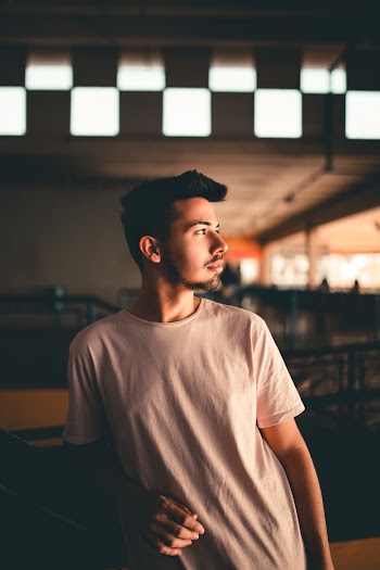 Photo Of Man Wearing White Shirt