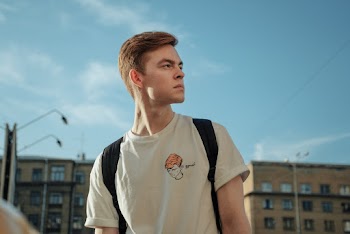 Photo of Man Wearing White Shirt
